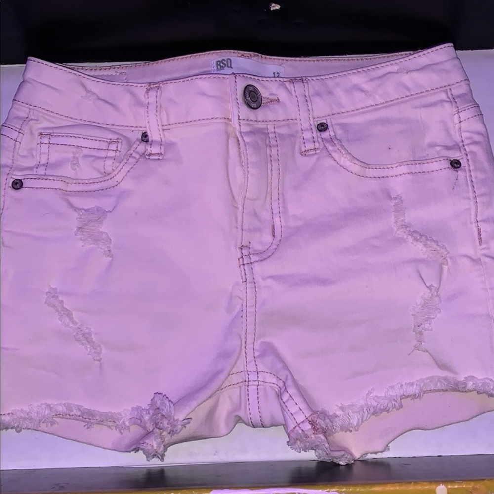 Mid rise distressed jean shorts